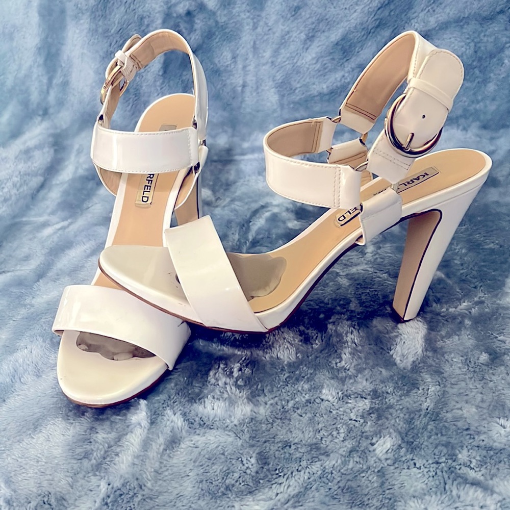 White patent leather Karl Lagerfeld heels with gold accents. Size 9.